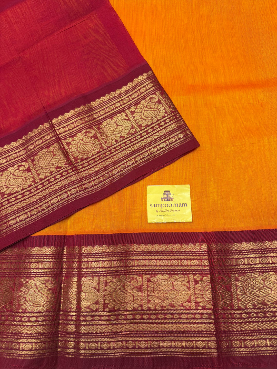 Mambazha Manjal with Kumkum Red  , Traditional Big Kanchi Borders and rich Pallu Korvai Silk Cotton Saree