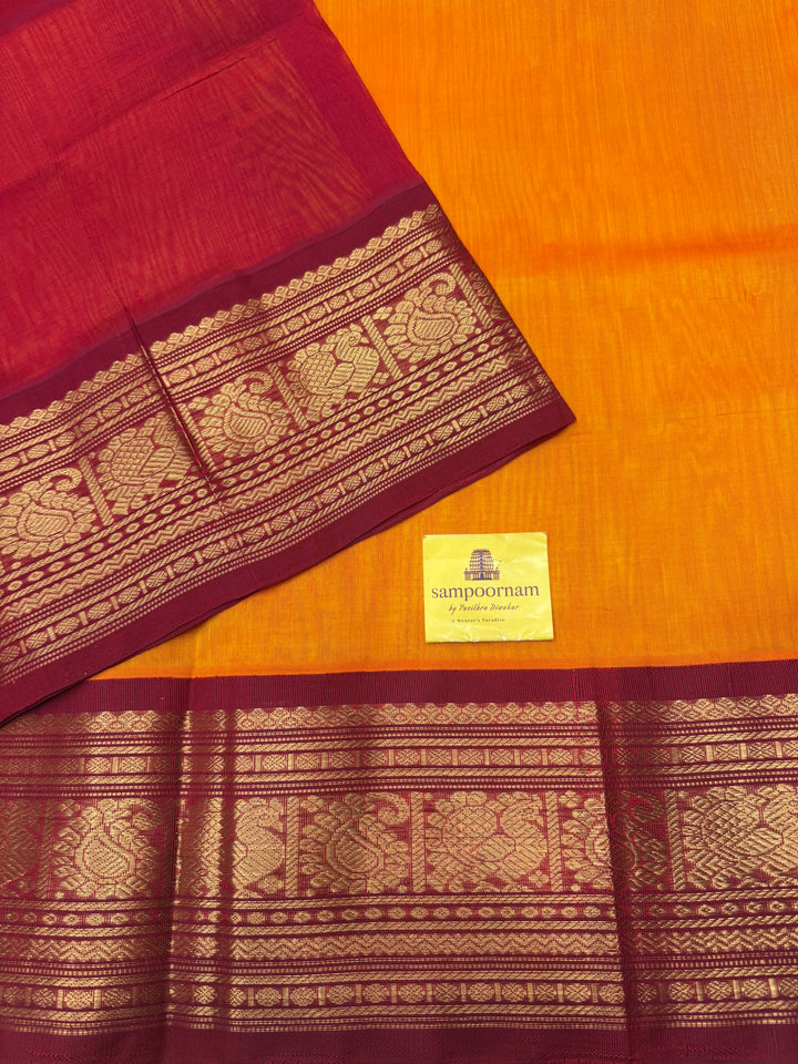 Mambazha Manjal with Kumkum Red  , Traditional Big Kanchi Borders and rich Pallu Korvai Silk Cotton Saree