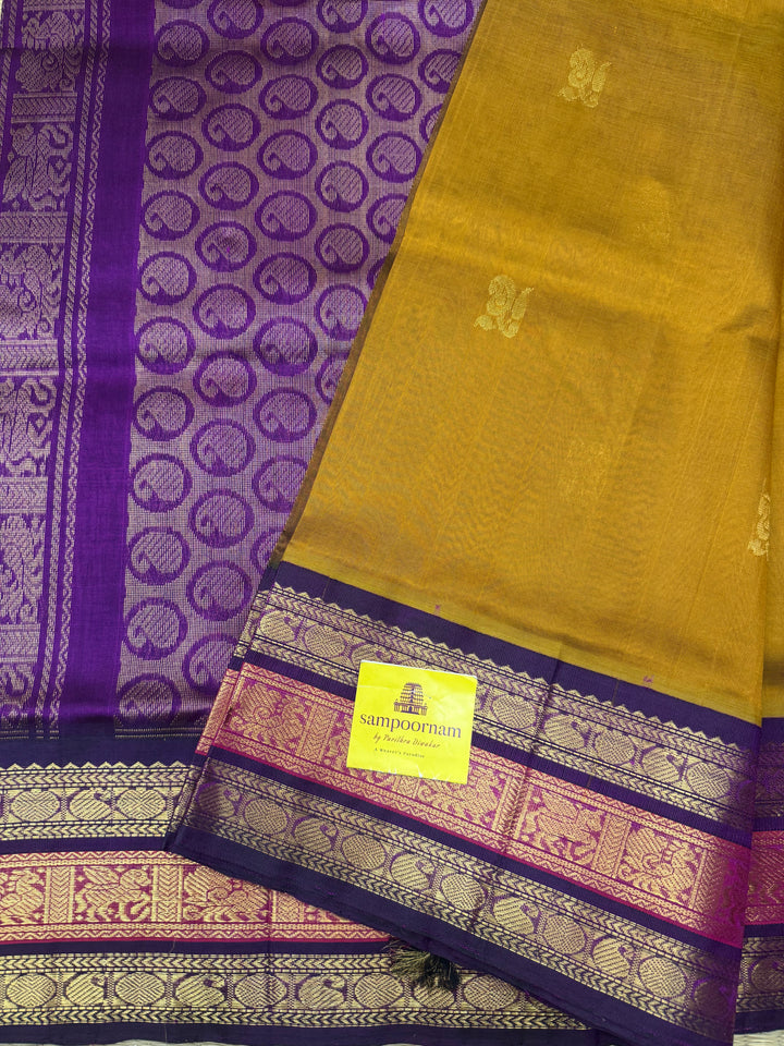 Fenugreek Vendhayam with Purple , rich Mango Zari Butta in the body , traditional Kanchi borders  and rich Pallu Korvai Silk Cotton Saree