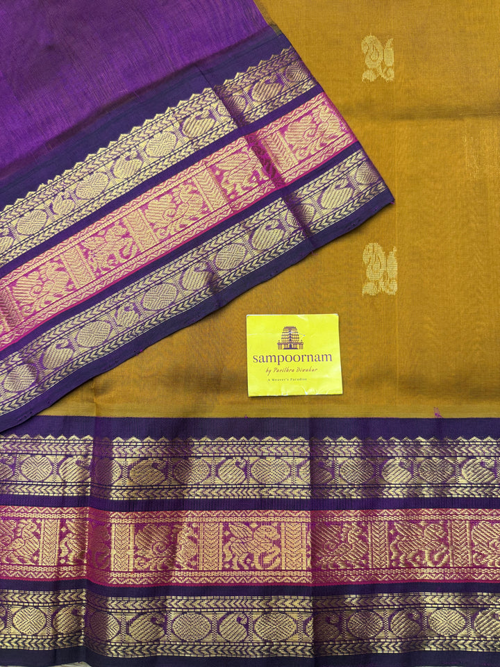 Fenugreek Vendhayam with Purple , rich Mango Zari Butta in the body , traditional Kanchi borders  and rich Pallu Korvai Silk Cotton Saree