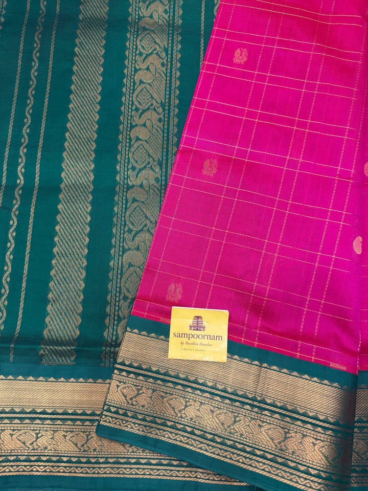 Pink with Green , rich Zari checks with Mayil Chakram butta in the body , rich Pallu Korvai Silk Cotton Saree