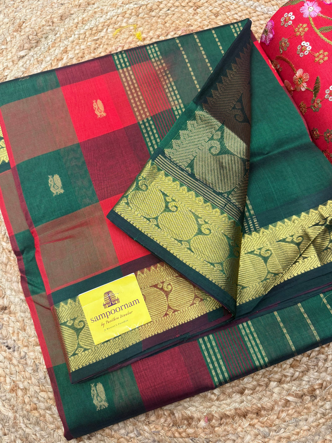 Red , Green , Maroon  with Green , Pallum Pazham checks with rich Mayil butta , traditional borders and  rich Pallu  Silk Cotton Saree