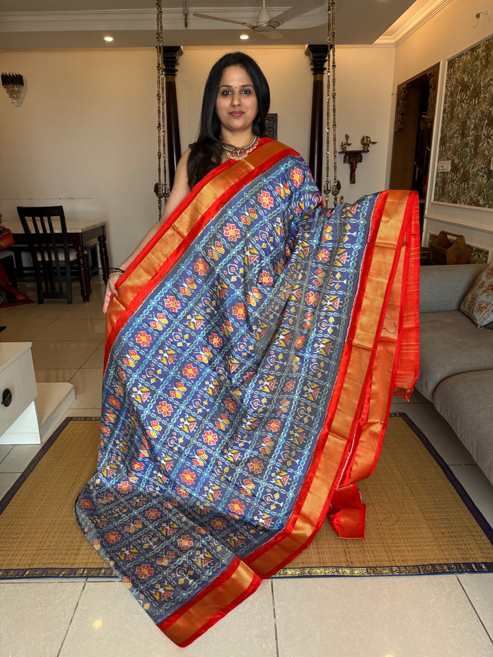 Blue with Orange , traditional borders and rich Pallu Pochampally Ikkat Silk Saree