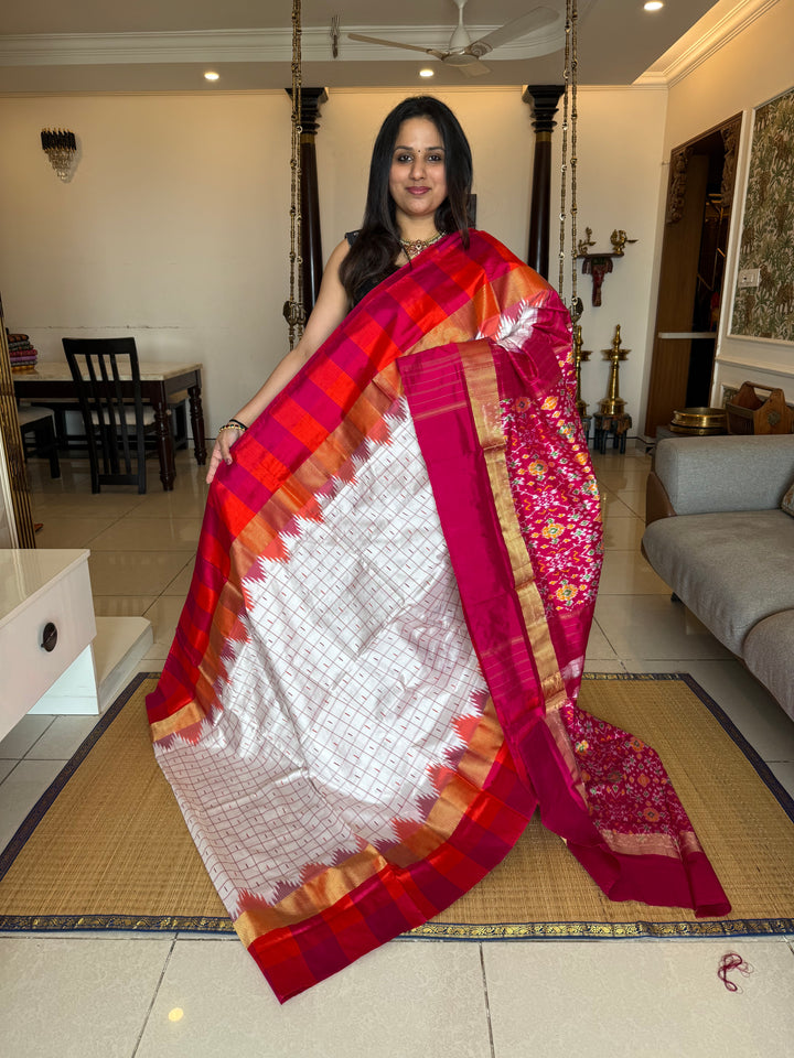 Offwhite with Pink , body checks and temple border , blouse design and rich Pallu Pochampally Ikkat Silk Saree
