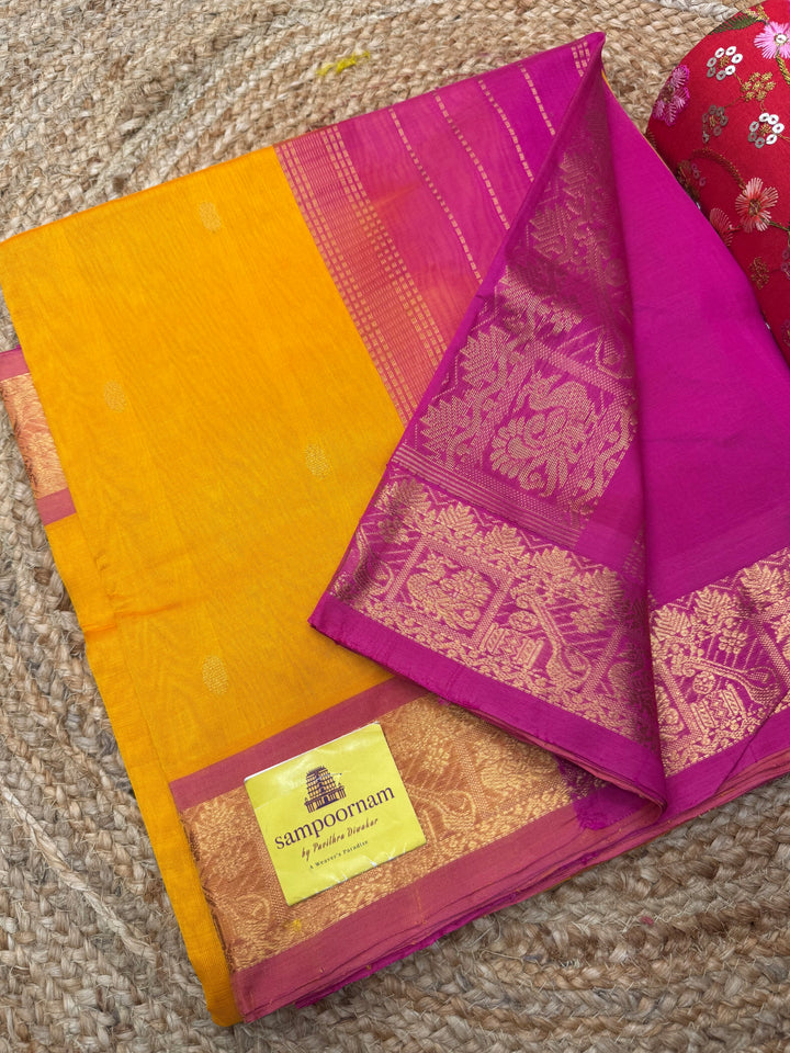 Mambazha Manjal with Pink , rich Zari butta in the body , Traditional Big Borders and rich Pallu  Silk Cotton Saree