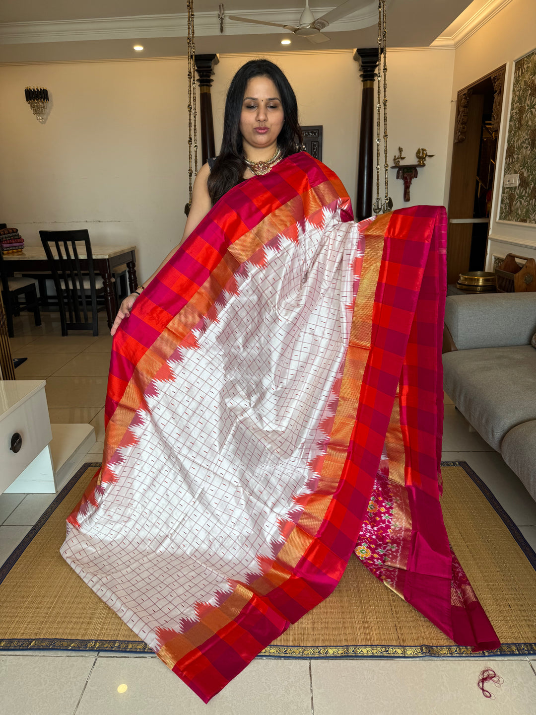 Offwhite with Pink , body checks and temple border , blouse design and rich Pallu Pochampally Ikkat Silk Saree