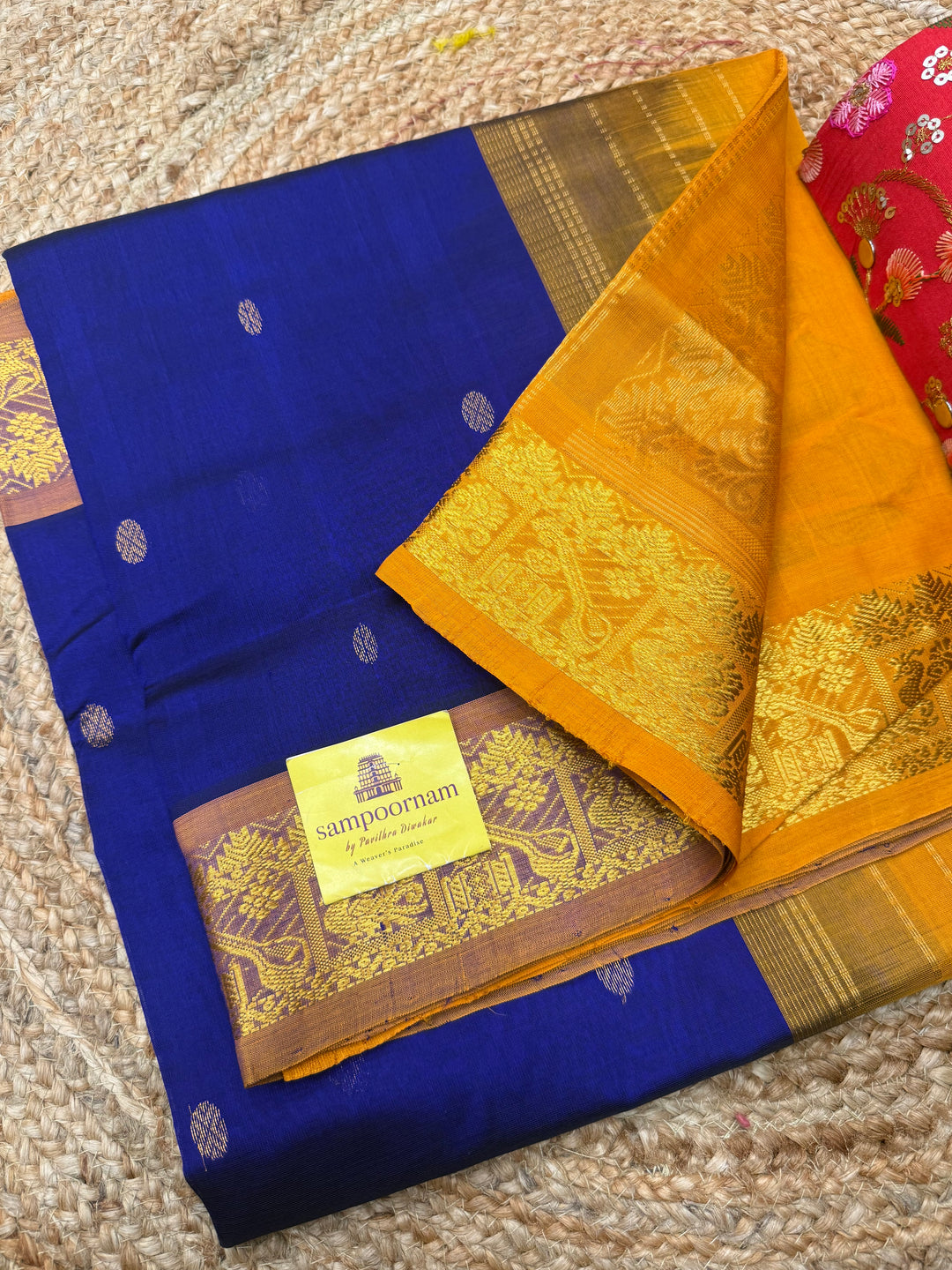 Ms Blue with Mustard , rich Zari butta in the body , Traditional Big Borders and rich Pallu  Silk Cotton Saree