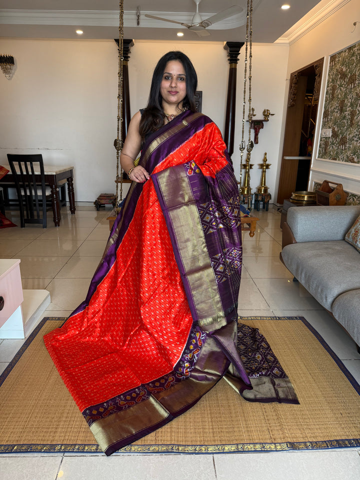 Orange with Purple ,checks in the body , traditional borders , work in blouse and rich Pallu Pochampally Ikkat Silk Saree