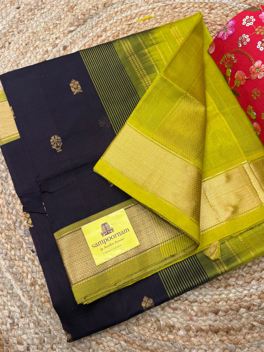 Dark Brown with Green  , rich Flower Zari butta in the body , Traditional Big Borders and rich Pallu  Silk Cotton Saree