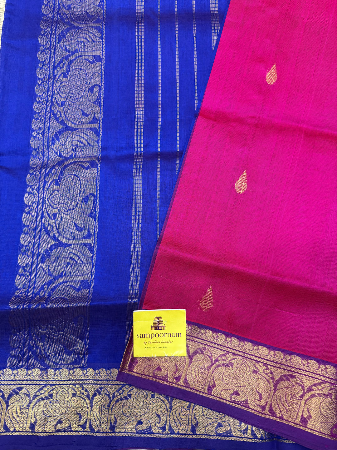 Pink with Indigo Blue  , rich Thilagam Zari butta in the body , Traditional Big Borders and rich Pallu  Silk Cotton Saree