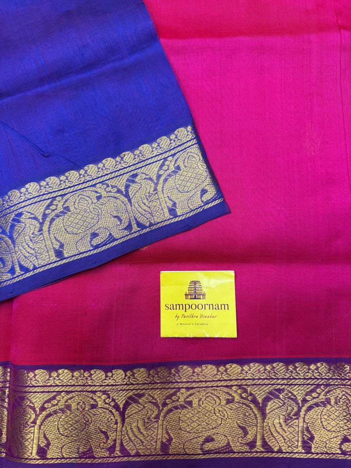 Pink with Indigo Blue  , rich Thilagam Zari butta in the body , Traditional Big Borders and rich Pallu  Silk Cotton Saree