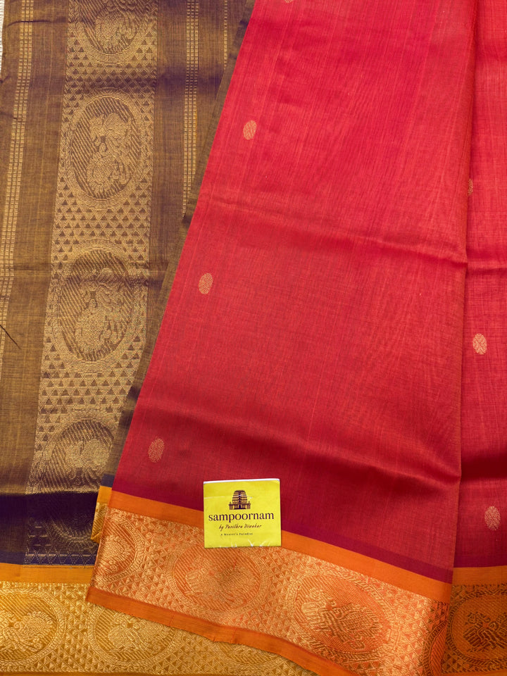 Orange with Light Brown , rich Zari butta in the body , Traditional Big Borders and rich Pallu  Silk Cotton Saree