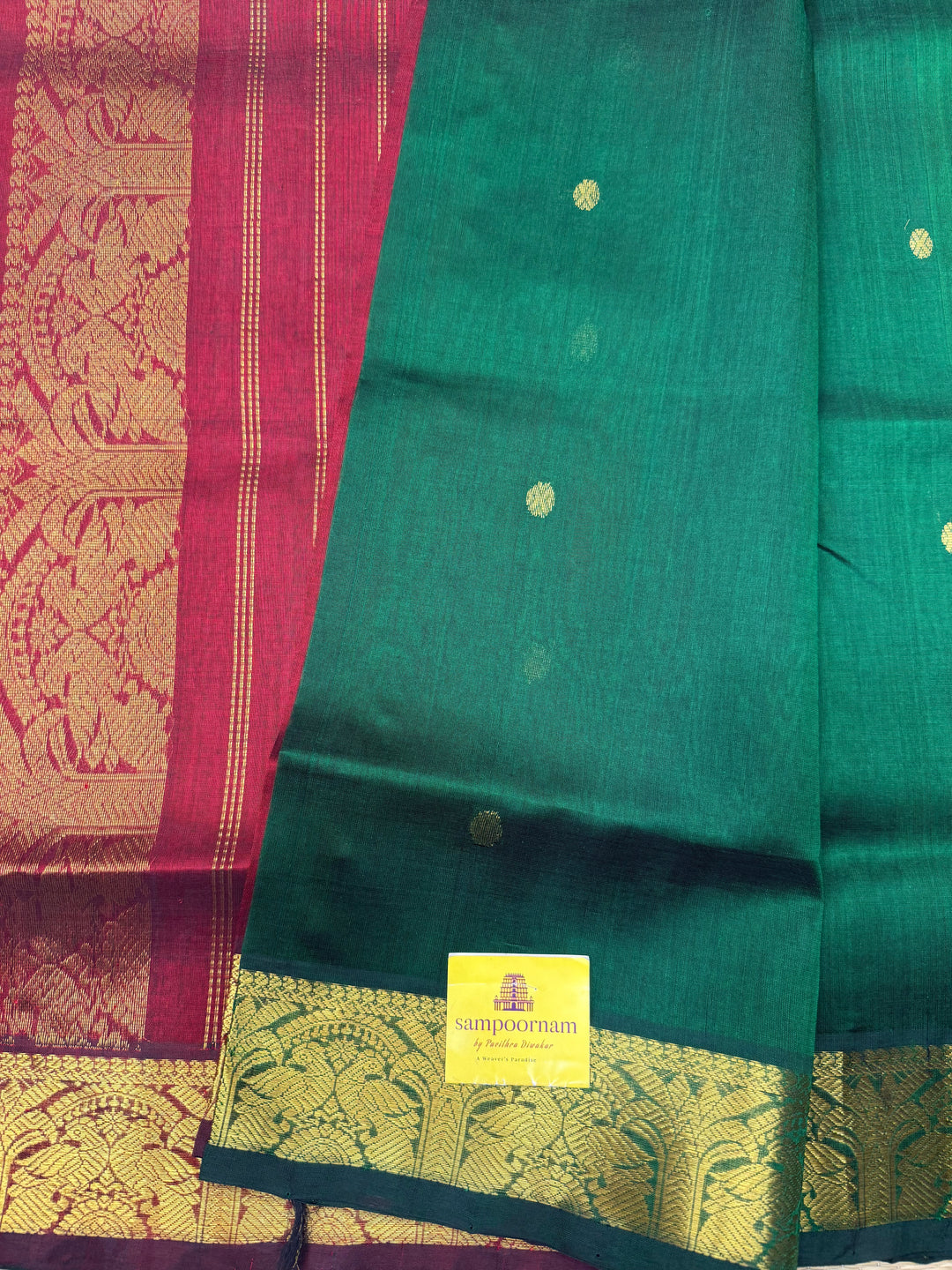 Green with Maroon  , rich Zari butta in the body , Traditional Big Borders and rich Pallu  Silk Cotton Saree