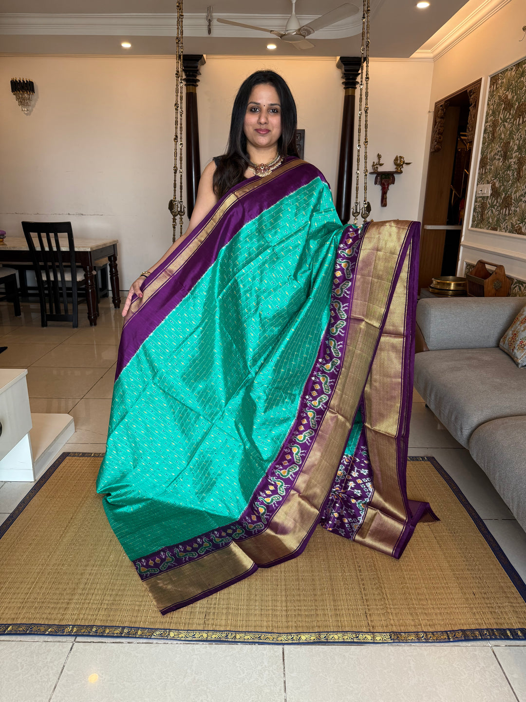 Turquoise Blue with Purple , checks in the body , design the blouse , traditional Kanchi borders and rich Pallu Pochampally Ikkat Silk Saree