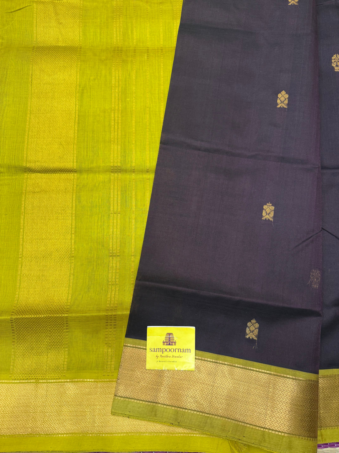 Dark Brown with Green  , rich Flower Zari butta in the body , Traditional Big Borders and rich Pallu  Silk Cotton Saree