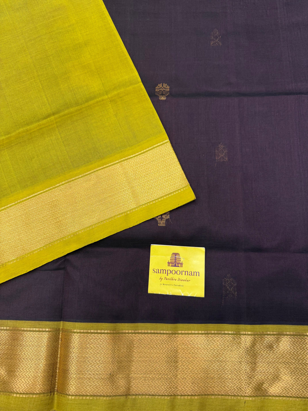 Dark Brown with Green  , rich Flower Zari butta in the body , Traditional Big Borders and rich Pallu  Silk Cotton Saree