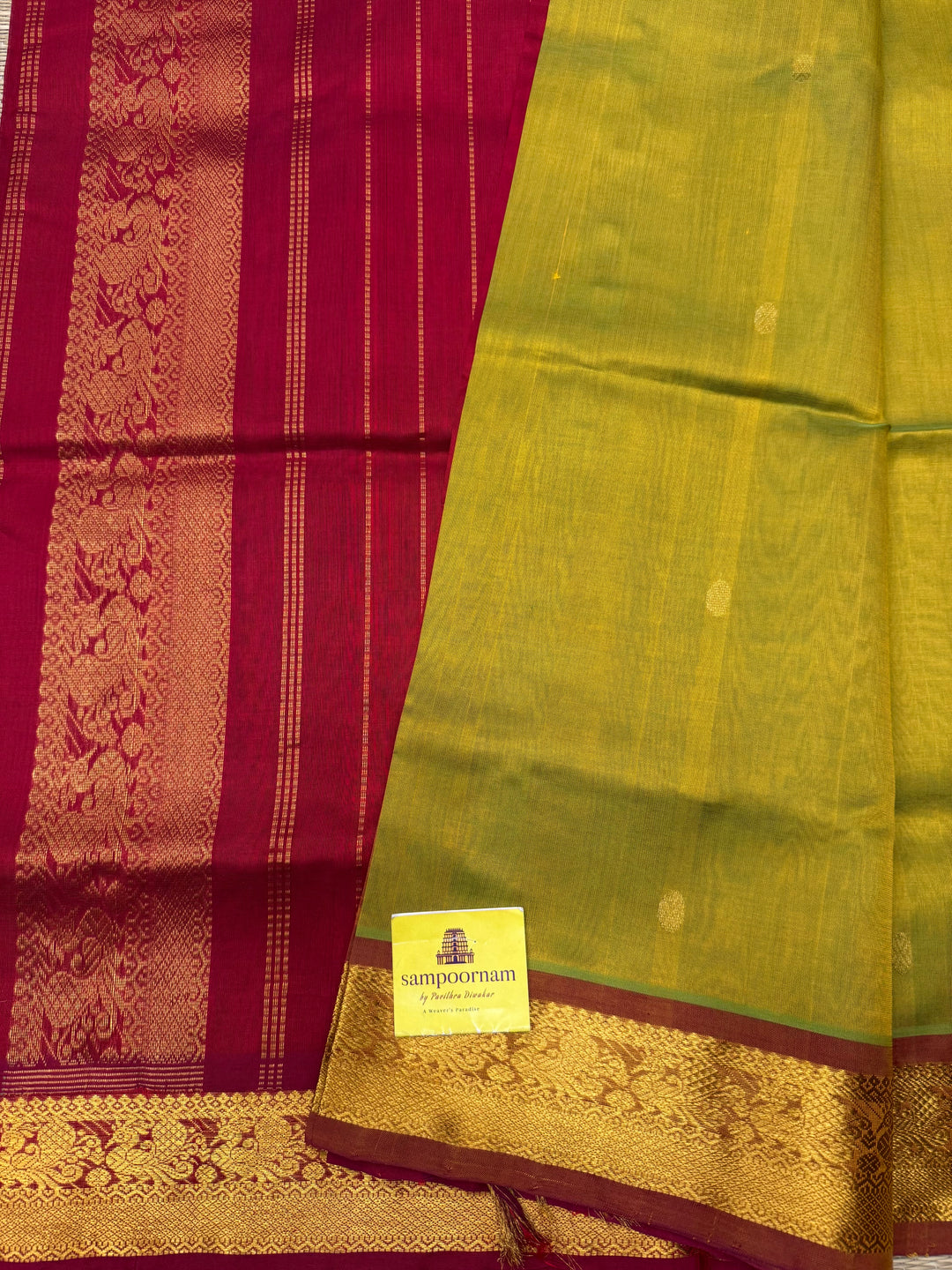 Light Green with Maroon , rich Zari butta in the body , Traditional Big Borders and rich Pallu  Silk Cotton Saree