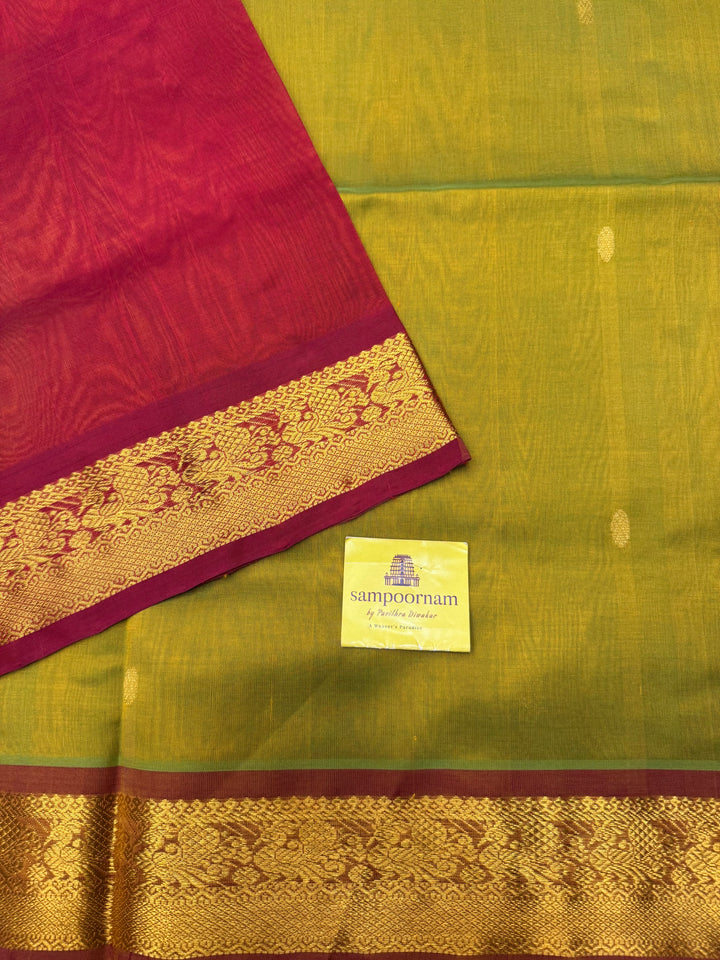 Light Green with Maroon , rich Zari butta in the body , Traditional Big Borders and rich Pallu  Silk Cotton Saree
