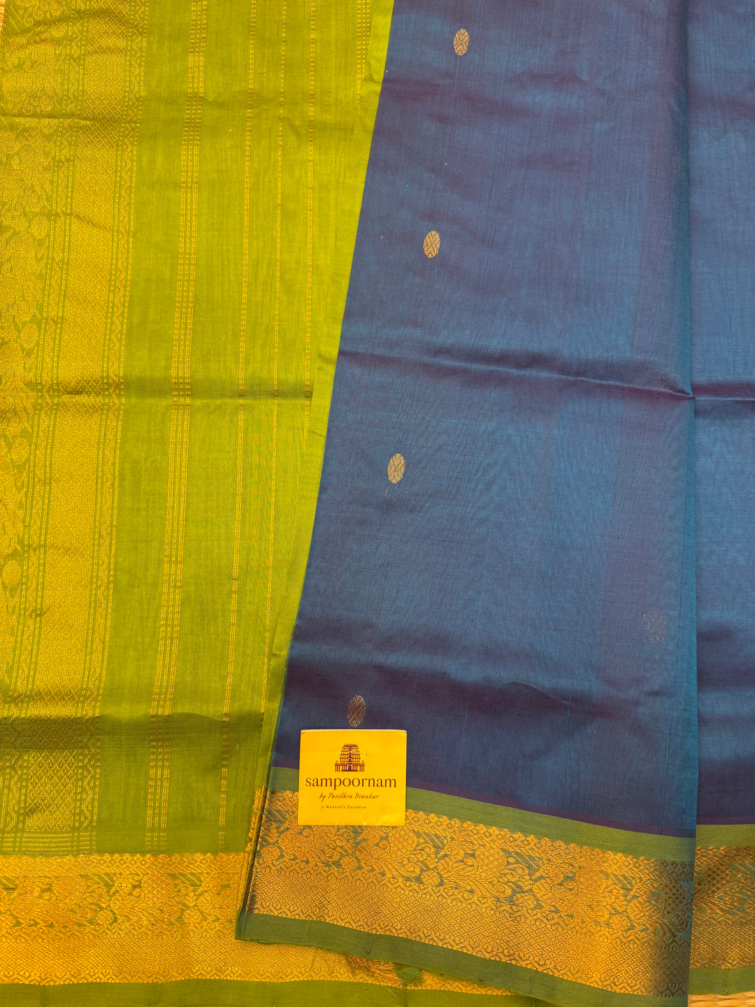 Coppersulfate Blue with Green , rich Zari butta in the body , Traditional Big Borders and rich Pallu  Silk Cotton Saree