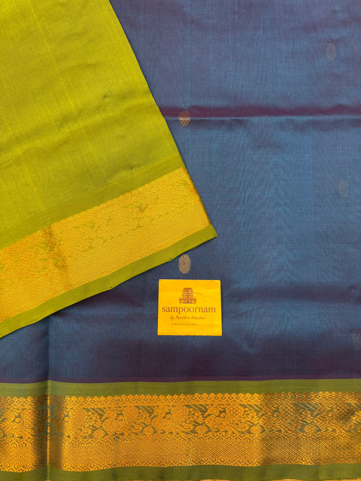 Coppersulfate Blue with Green , rich Zari butta in the body , Traditional Big Borders and rich Pallu  Silk Cotton Saree