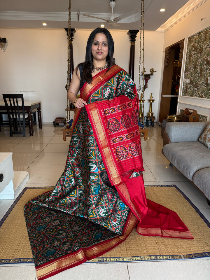Green with Red , traditional borders and rich Pallu Pochampally Ikkat Silk Saree