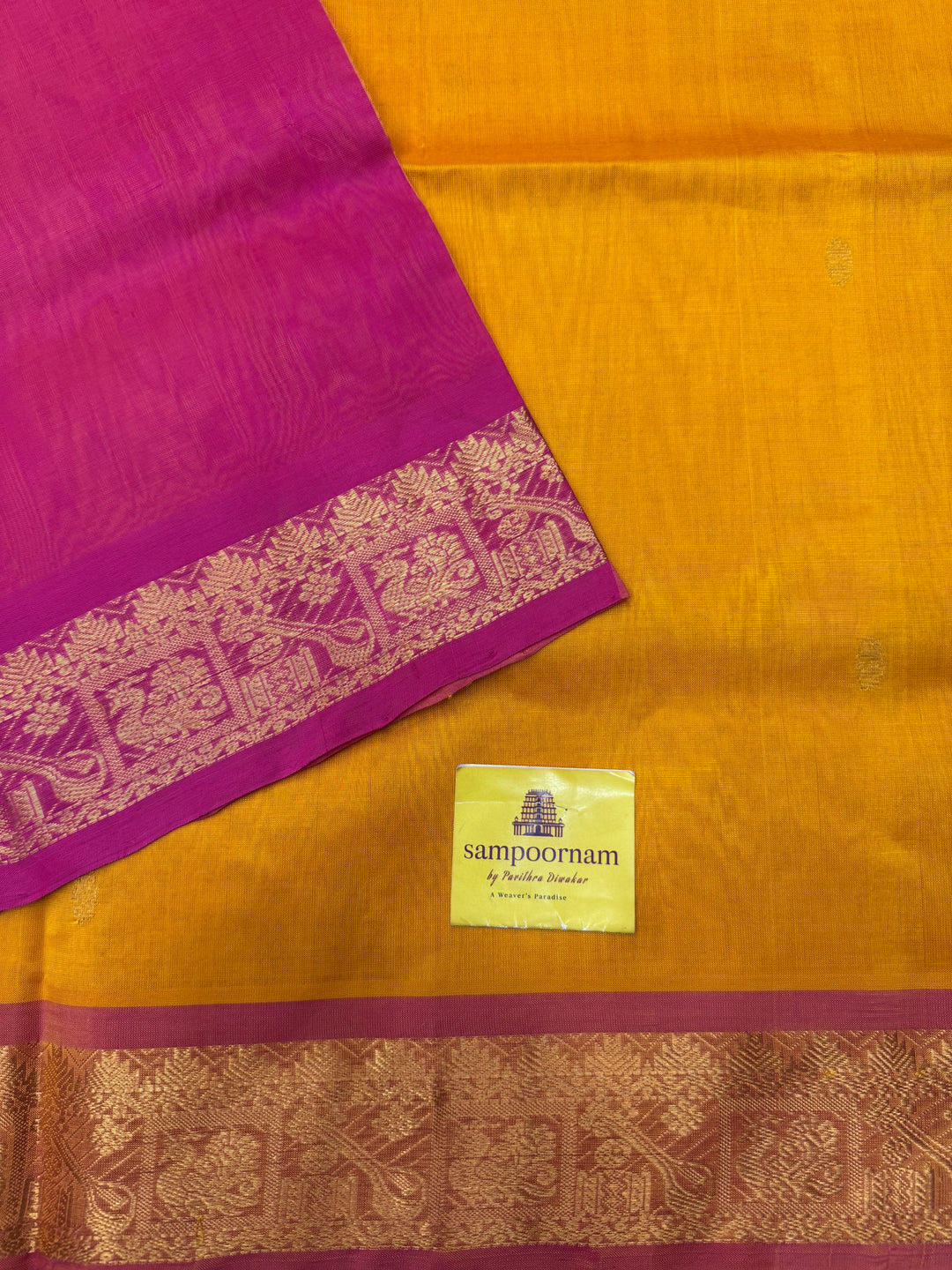 Mambazha Manjal with Pink , rich Zari butta in the body , Traditional Big Borders and rich Pallu  Silk Cotton Saree