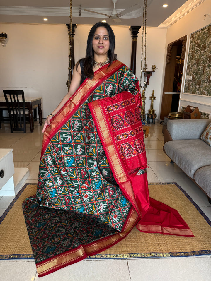 Green with Red , traditional borders and rich Pallu Pochampally Ikkat Silk Saree
