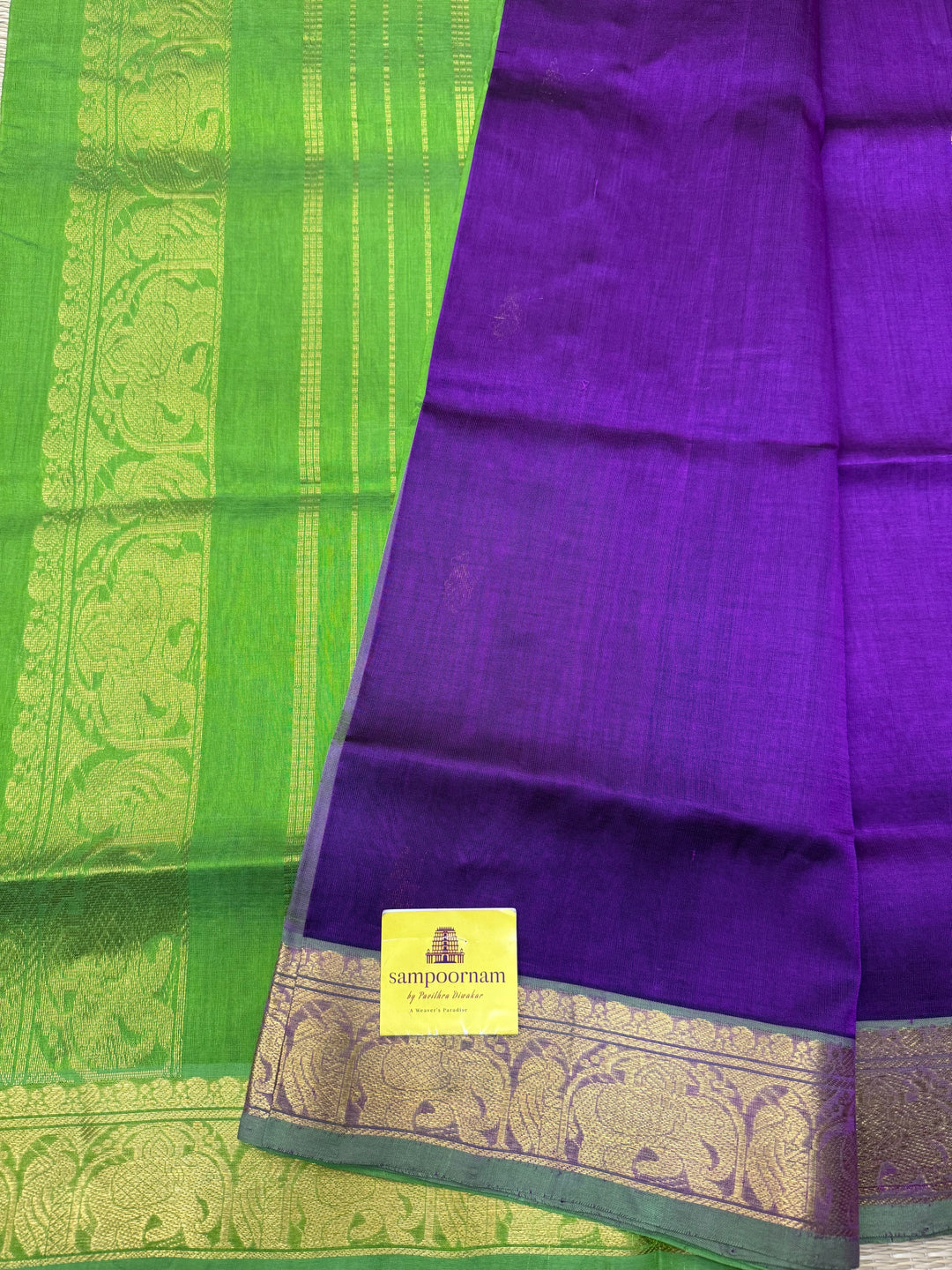 Vadamalli with Green  , rich Thilagam  Zari butta in the body , Traditional Big Borders and rich Pallu  Silk Cotton Saree