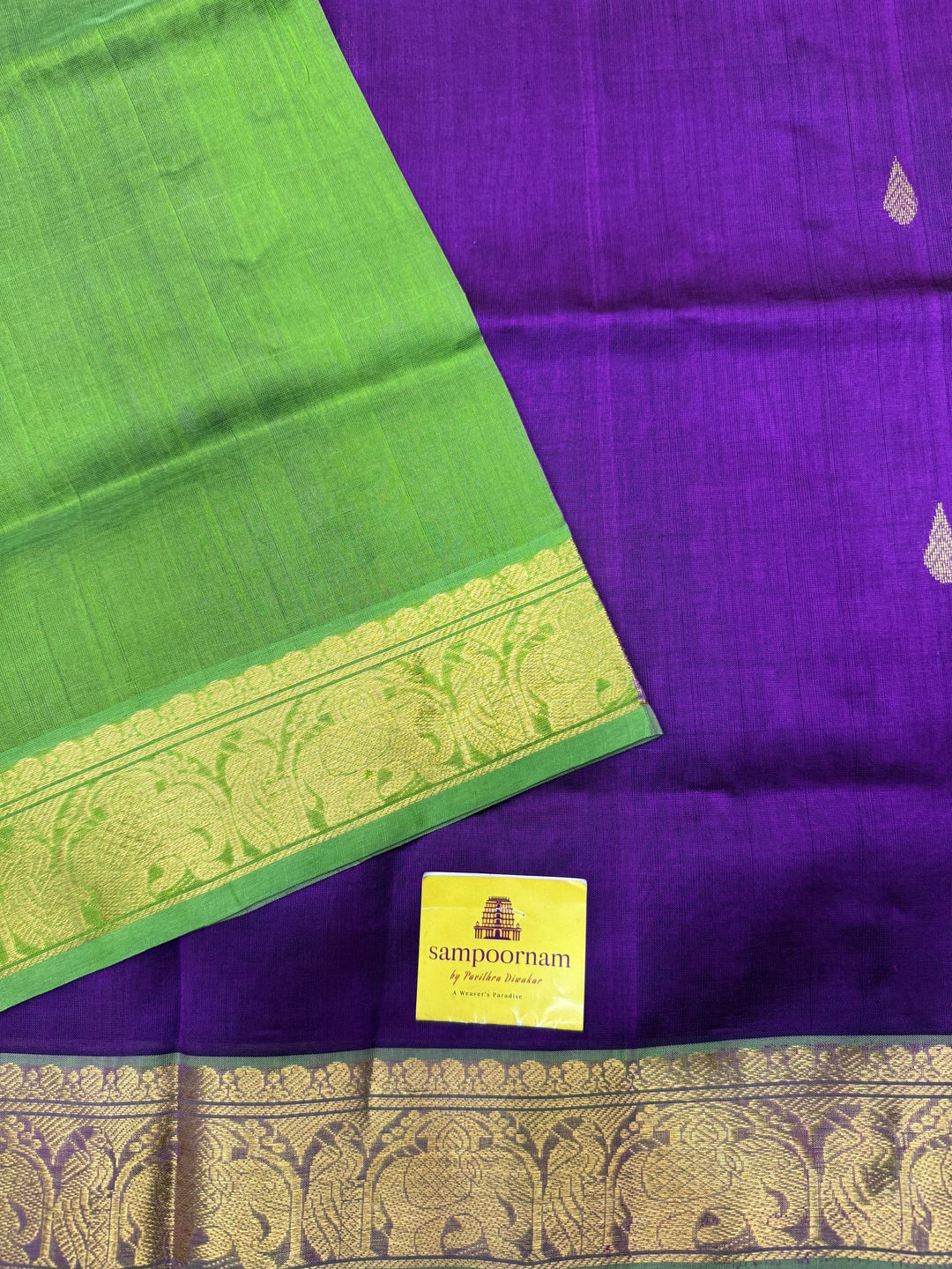 Vadamalli with Green  , rich Thilagam  Zari butta in the body , Traditional Big Borders and rich Pallu  Silk Cotton Saree