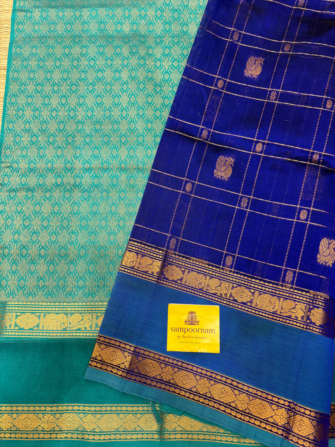 Royal Blue with Turquoise Blue  , Zari Checks with Chakram and Mayil butta in the body , Traditional borders and  rich Pallu Silk Cotton Saree