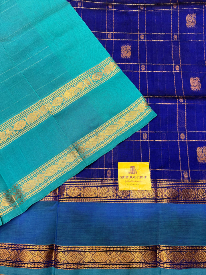 Royal Blue with Turquoise Blue  , Zari Checks with Chakram and Mayil butta in the body , Traditional borders and  rich Pallu Silk Cotton Saree