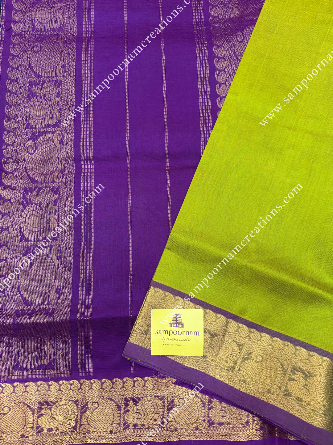 Lemon Yellow with Dark Magenta  , Rich Zari Butta in the body , traditional borders and rich Pallu Silk Cotton Saree