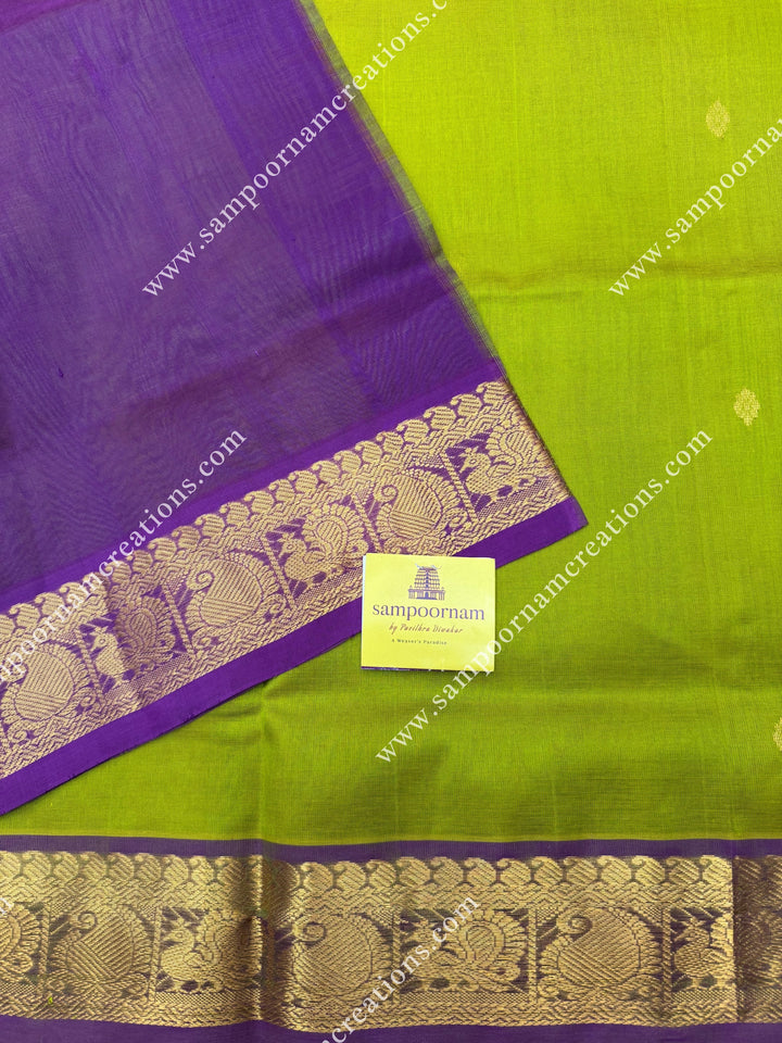 Lemon Yellow with Dark Magenta  , Rich Zari Butta in the body , traditional borders and rich Pallu Silk Cotton Saree