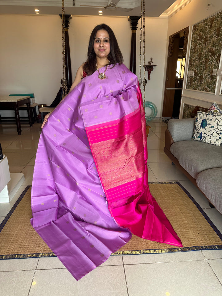 A Lovely Lavender and Pink Saree with Rich Mayil and Chakram Motif WIth Rich Pallu Pure Kanjivaram Silk Saree