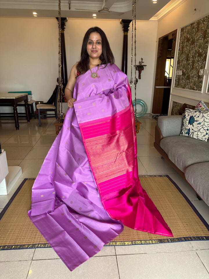 A Lovely Lavender and Pink Saree with Rich Mayil and Chakram Motif WIth Rich Pallu Pure Kanjivaram Silk Saree