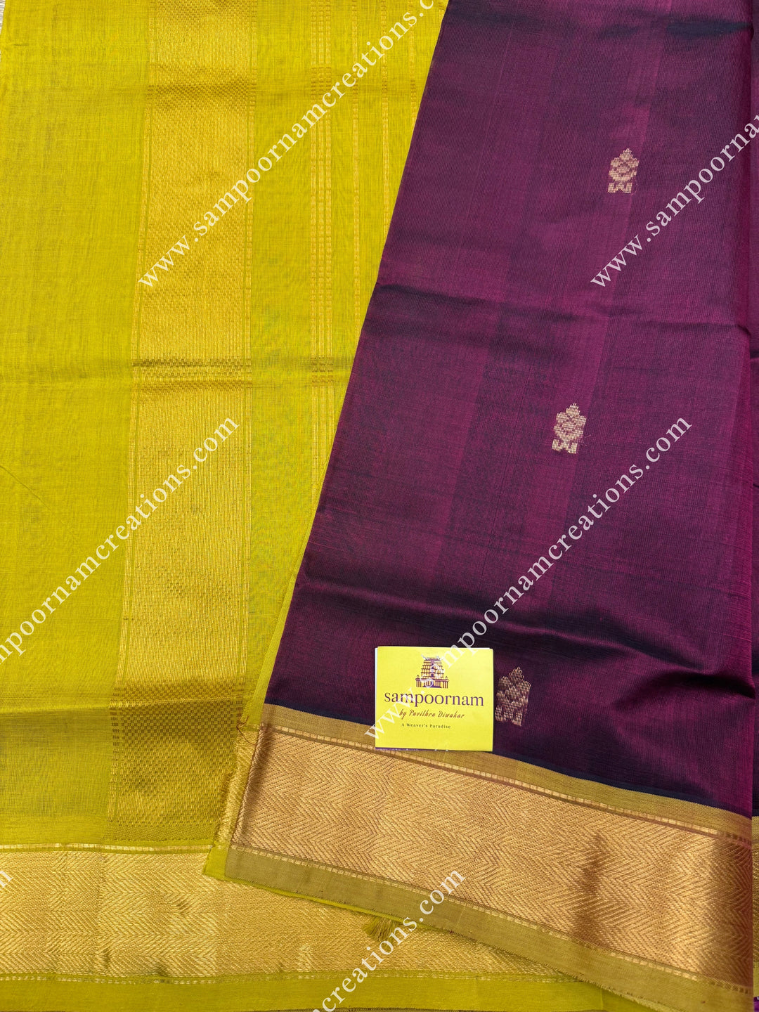 Arakku with Lemon Yellow  , Green Selvedge , Rich Floral Zari Buttta in the body , traditional borders and rich Pallu Silk Cotton Saree