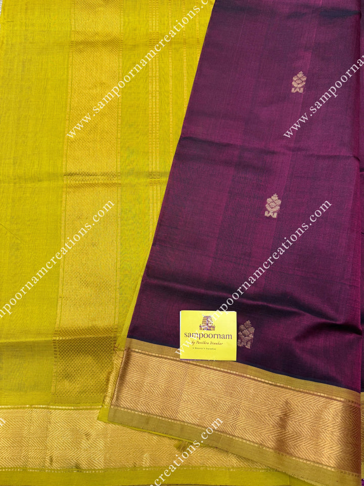 Arakku with Lemon Yellow  , Green Selvedge , Rich Floral Zari Buttta in the body , traditional borders and rich Pallu Silk Cotton Saree