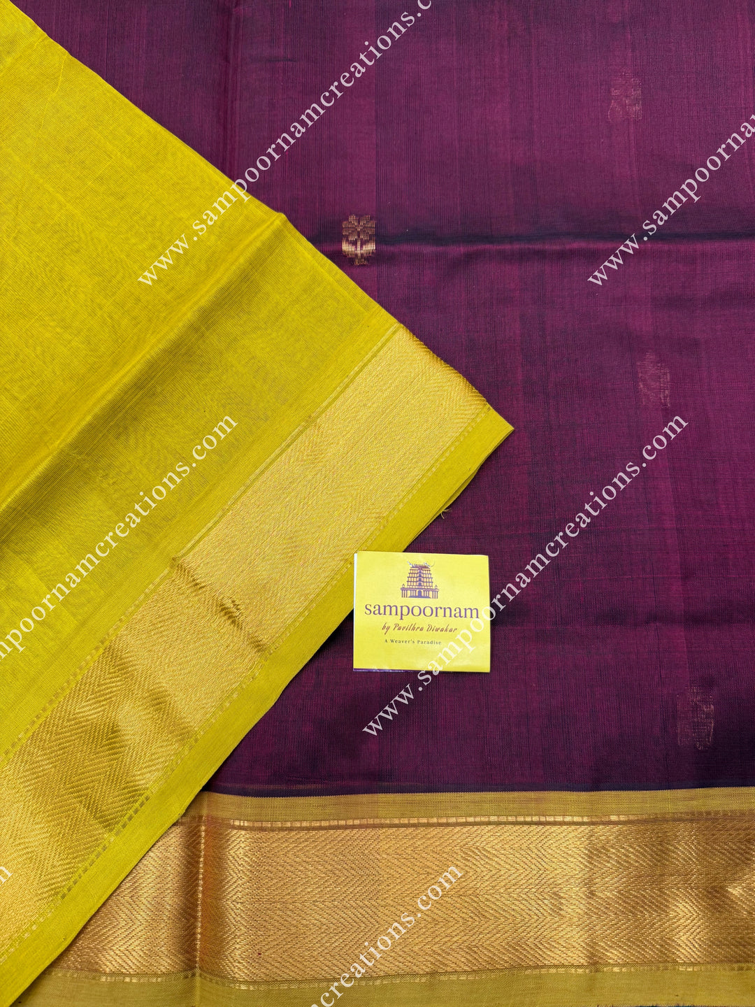 Arakku with Lemon Yellow  , Green Selvedge , Rich Floral Zari Buttta in the body , traditional borders and rich Pallu Silk Cotton Saree