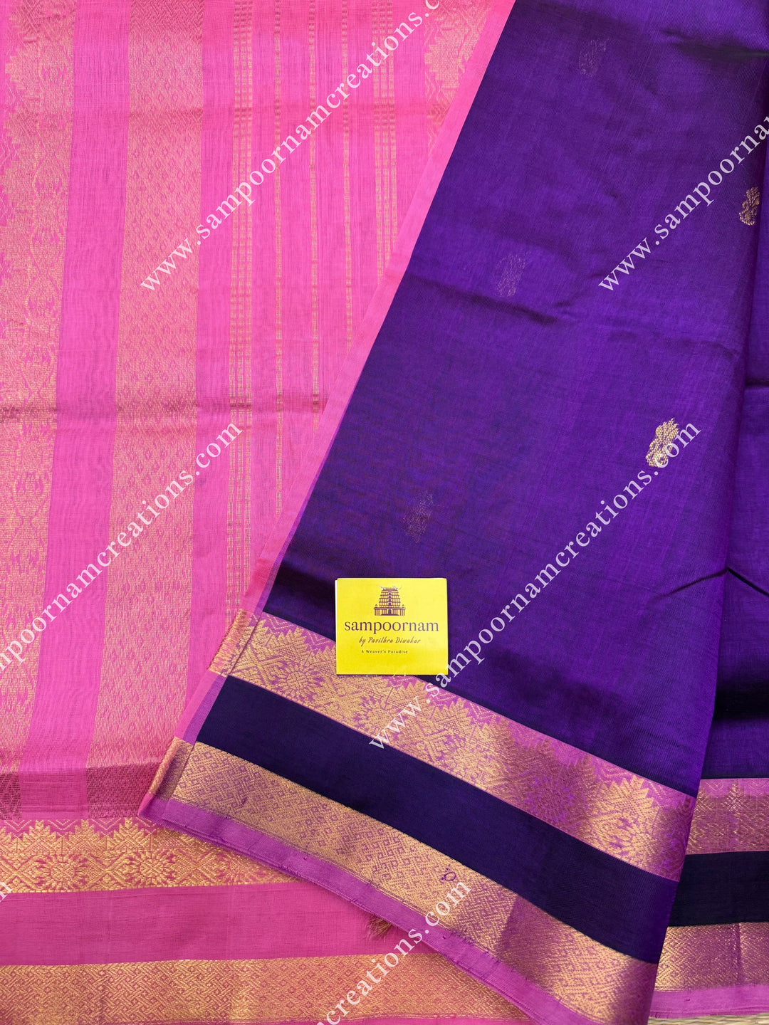 Purple with Baby Pink  , Rich  Floral Zari Butta in the body , traditional borders and rich Pallu Silk Cotton Saree