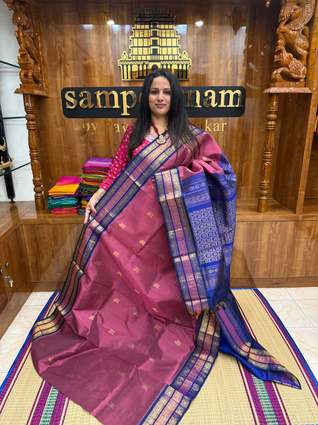 Mauve with Blue , rich Zari Mango  butta in the body , Traditional Kanchi borders and  rich Pallu Silk Cotton Saree