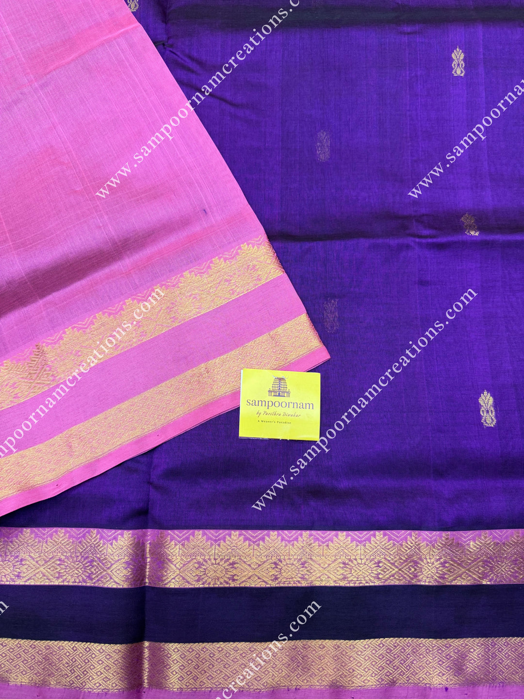 Purple with Baby Pink  , Rich  Floral Zari Butta in the body , traditional borders and rich Pallu Silk Cotton Saree