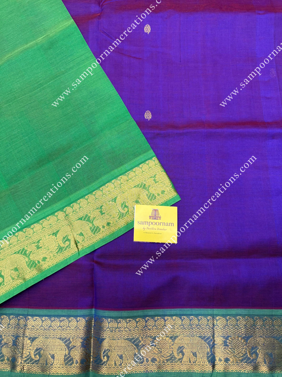 Vadamalli with Parrot Green  , Rich Zari Butta in the body , traditional borders and rich Pallu Silk Cotton Saree