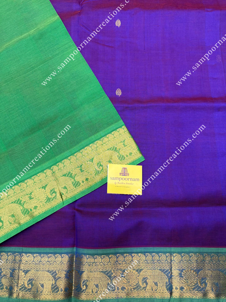 Vadamalli with Parrot Green  , Rich Zari Butta in the body , traditional borders and rich Pallu Silk Cotton Saree