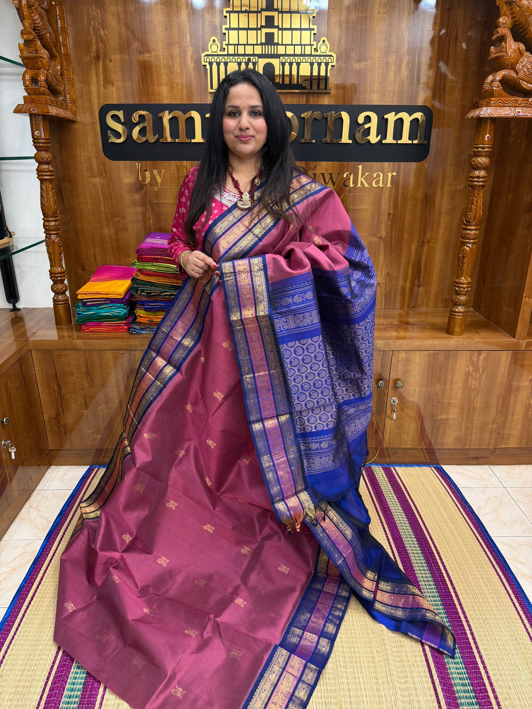 Mauve with Blue , rich Zari Mango  butta in the body , Traditional Kanchi borders and  rich Pallu Silk Cotton Saree