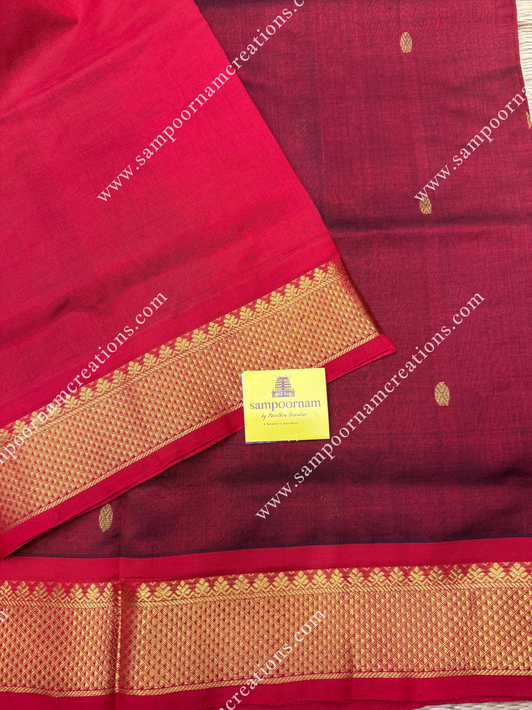 Marron with Red  , Rich Zari Butta in the body , traditional borders and rich Pallu Silk Cotton Saree