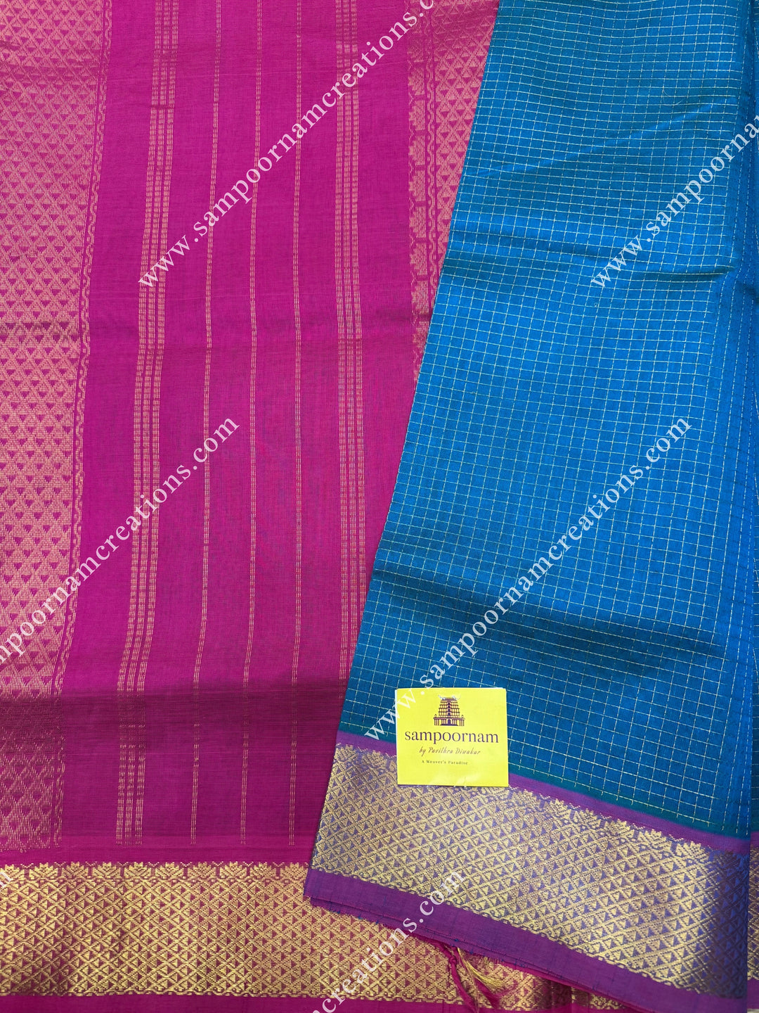 Turquoise Blue with Magenta , Rich Zari Checks in the body , traditional borders and rich Pallu Silk Cotton Sarees