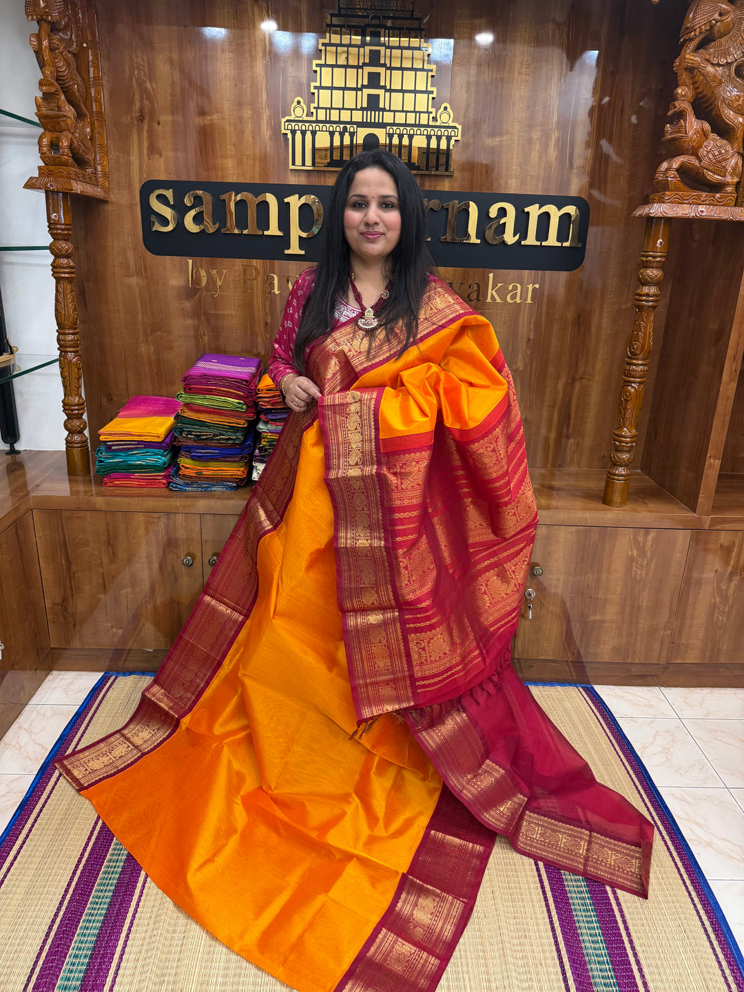 Mambazha Manjal with Kumkum Red  , Traditional Big Kanchi Borders and rich Pallu Korvai Silk Cotton Saree
