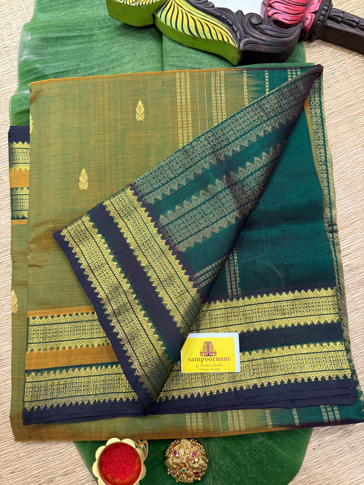 Fenugreek Green with Dark Green Rettapet Border and Zari Butta in the Body Traditional Borders and Rich Pallu Pure Silk Cotton Saree
