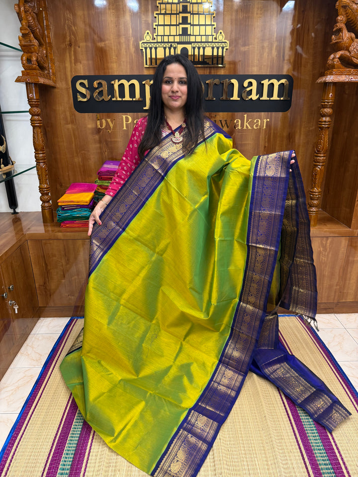 Sneha Green with Dark Blue , Traditional Big Kanchi Borders and rich Pallu Korvai Silk Cotton Saree