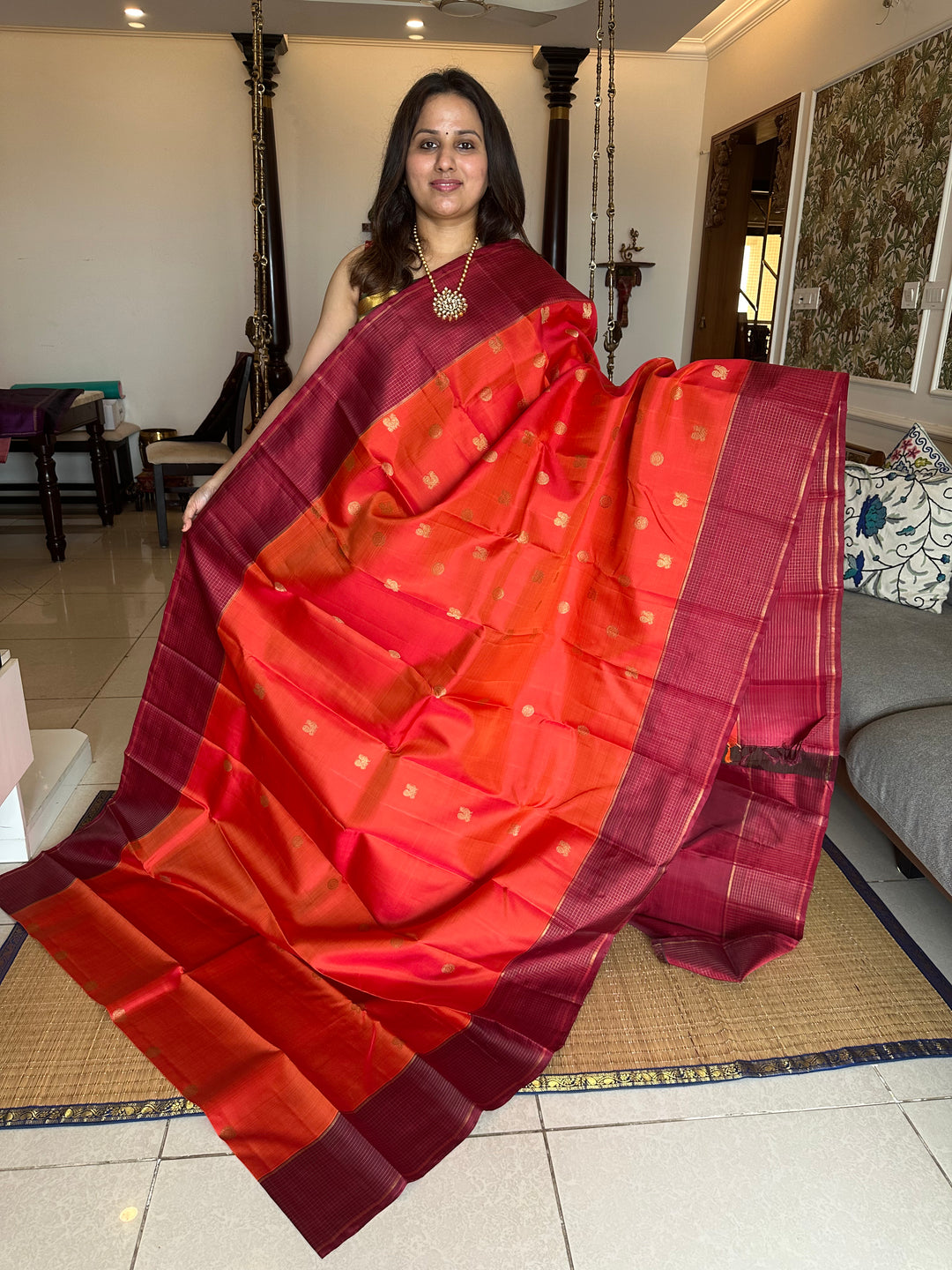 A Traditional Dark orange with Araku , Zari Checks Border , Mayil Chakram Zari Butta in Body and Traditional Rich Pallu Pure Kanjivaram Silk Saree